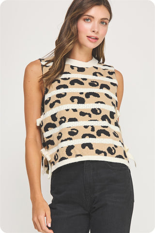 sleeveless leopard print top with beige background