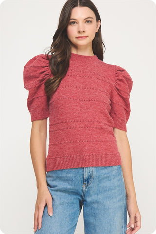 red textured sweater with puff sleeves 