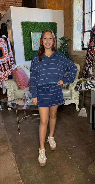 Pin Stripe Long Sleeve Top/Skort Set is a matching set that  is navy with ivory stripe detail. 