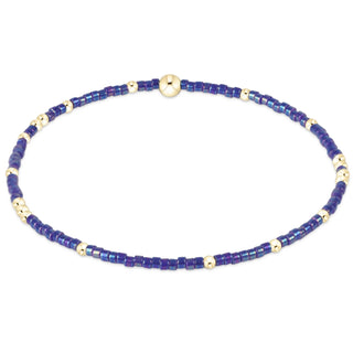 enewton Hope Unwritten Bracelet - Blue Metallic is a bracelet with metallic blue and gold beads. 