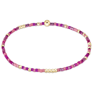 enewton Hope Unwritten Bracelet - Back To The Fuchsia is a bracelet with fuchsia and gold beads. 