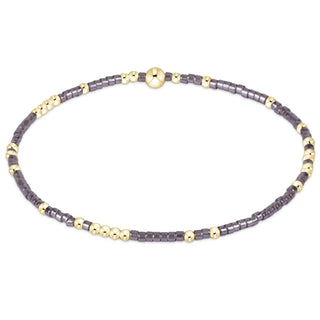 enewton Hope Unwritten Bracelet - Taupe With A Twist is abracelet with taupe and gold beads 