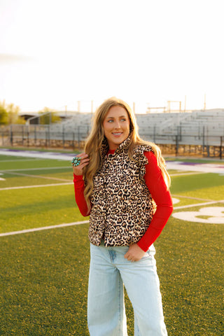 leopard print puffer vest with ruffle trim 