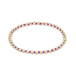 enewton Hope Grateful Bracelet - Fuchsia is a bracelet with fuchsia and gold beads. 