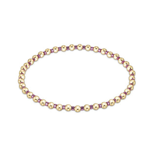 enewton Hope Grateful Bracelet - Pink Metallic is a bracelet with gold and pink metallic beads. 
