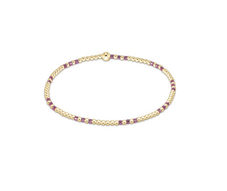 enewton Hope Joy Pattern 2mm Bead Bracelet - Pink Metallic is a gold and pink metallic beaded bracelet. 