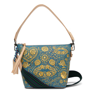 Blue handbag with gold floral pattern on a white background