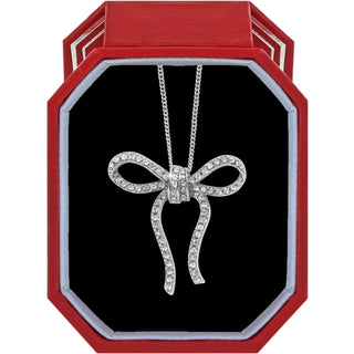 Brighton Illumina Bow Necklace w/ Gift Box is a silver bow-shaped necklace in a red and black box