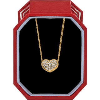 Brighton Illumina Celeste Heart Petite Necklace w/ Gift Box is a gold heart-shaped necklace with clear stones in a red and silver box