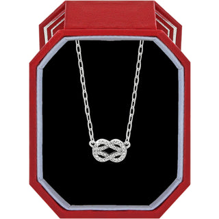 Brighton Interlok Harmony Luxe Petite Necklace w/ Gift Box is a silver necklace with a double infinity symbol pendant in a red and black jewelry box.