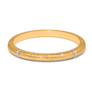 Brighton Meridian Geo Hinged Bangle is a gold bracelet with diamond accents on a white background