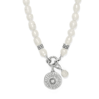 Brighton Token Charm Pearl Necklace is a pearl necklace with silver charms