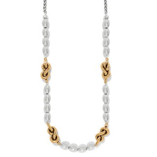 Brighton Interlok Single Knot Drops Collar Necklace is a necklace with alternating silver beads and gold knot beads 